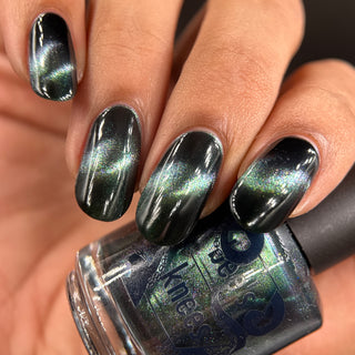 Image provided for Bee's Knees by a paid swatcher featuring the nail polish " Midnight Yoga and Seaweed "