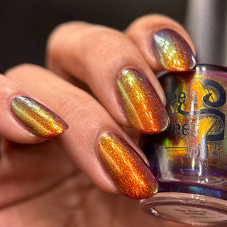 Image provided for Bee's Knees by a paid swatcher featuring the nail polish " The Bar is in Hell "