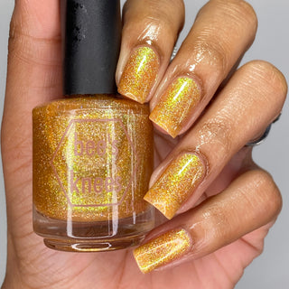 Image provided for Bee's Knees by a paid swatcher featuring the nail polish " The Golden Path "