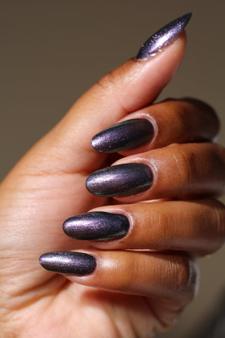 Image provided for Bee's Knees by a paid swatcher featuring the nail polish " Discord "