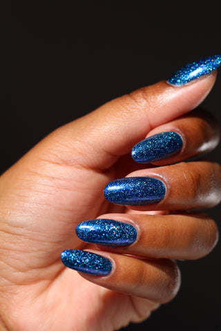 Image provided for Bee's Knees by a paid swatcher featuring the nail polish " Game Playing Deviant "