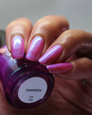 Image provided for Bee's Knees by a paid swatcher featuring the nail polish " Lamentation "