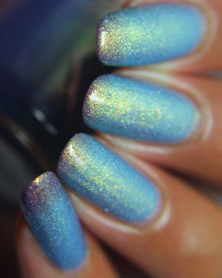 Image provided for Bee's Knees by a paid swatcher featuring the nail polish " Let the Ocean Take Me "