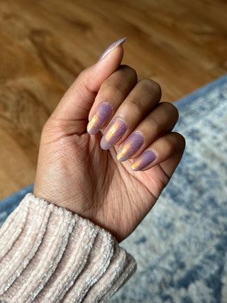 Image provided for Bee's Knees by a paid swatcher featuring the nail polish " Go Home "