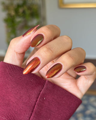 Image provided for Bee's Knees by a paid swatcher featuring the nail polish " The Bar is in Hell "