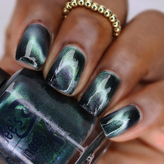 Image provided for Bee's Knees by a paid swatcher featuring the nail polish " Midnight Yoga and Seaweed "