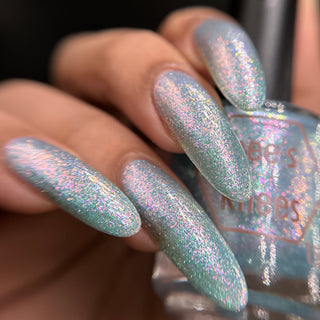 Image provided for Bee's Knees by a paid swatcher featuring the nail polish " Heartbreak "