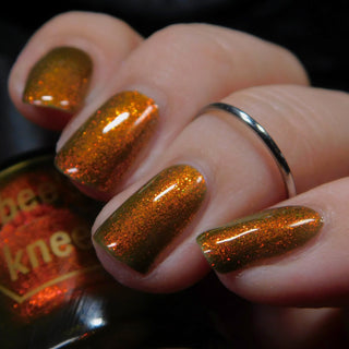 Image provided for Bee's Knees by a paid swatcher featuring the nail polish " I Went to Hell For You "