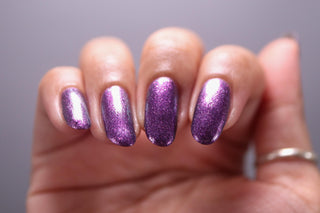 Image provided for Bee's Knees by a paid swatcher featuring the nail polish " Nevermore "