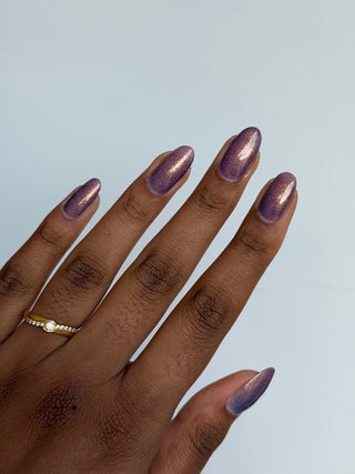 Image provided for Bee's Knees by a paid swatcher featuring the nail polish " Let the Ocean Take Me "
