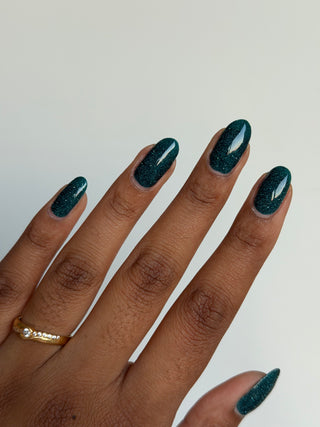 Image provided for Bee's Knees by a paid swatcher featuring the nail polish " From the Depths "