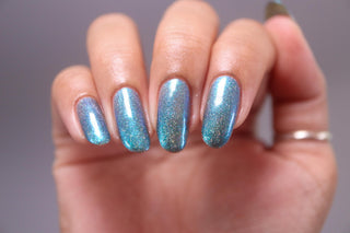 Image provided for Bee's Knees by a paid swatcher featuring the nail polish " Mind the Mist "