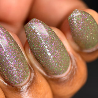 Image provided for Bee's Knees by a paid swatcher featuring the nail polish " Boil Beetle Venom "