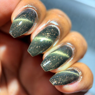Image provided for Bee's Knees by a paid swatcher featuring the nail polish " Stormfall "
