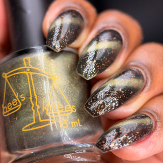 Image provided for Bee's Knees by a paid swatcher featuring the nail polish " Stormfall "