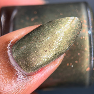 Image provided for Bee's Knees by a paid swatcher featuring the nail polish " Stormfall "