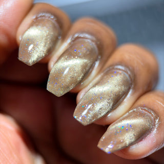 Image provided for Bee's Knees by a paid swatcher featuring the nail polish " Violentia nervus potestas "