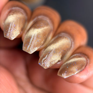 Image provided for Bee's Knees by a paid swatcher featuring the nail polish " Violentia nervus potestas "