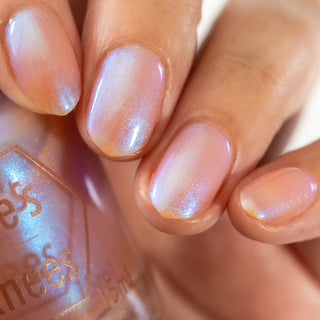 Image provided for Bee's Knees by a paid swatcher featuring the nail polish " Through Love, All is Possible "