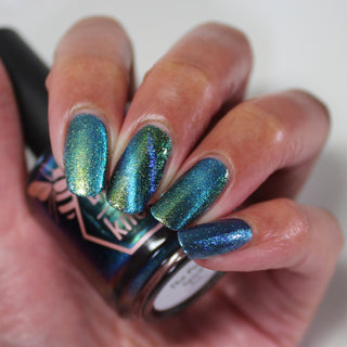 Image provided for Bee's Knees by a paid swatcher featuring the nail polish " The Pond Spirit "