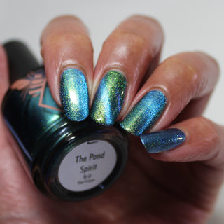 Image provided for Bee's Knees by a paid swatcher featuring the nail polish " The Pond Spirit "