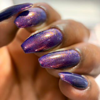 Image provided for Bee's Knees by a paid swatcher featuring the nail polish " The Great Unraveling "
