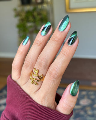 Image provided for Bee's Knees by a paid swatcher featuring the nail polish " Midnight Yoga and Seaweed "