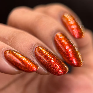 Image provided for Bee's Knees by a paid swatcher featuring the nail polish " The Dark Angel "
