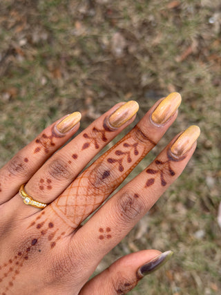 Image provided for Bee's Knees by a paid swatcher featuring the nail polish " We can Both be Human "