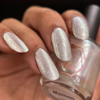 Image provided for Bee's Knees by a paid swatcher featuring the nail polish " Maman "