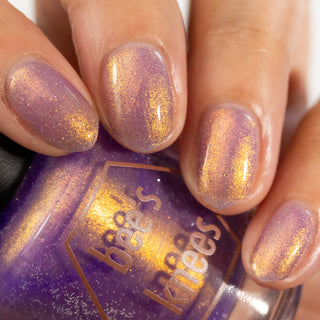 Image provided for Bee's Knees by a paid swatcher featuring the nail polish " Go Home "
