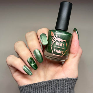 Image provided for Bee's Knees by a paid swatcher featuring the nail polish " Believing Something does not Make it True "