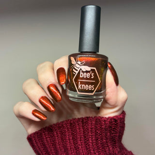 Image provided for Bee's Knees by a paid swatcher featuring the nail polish " The Dark Angel "
