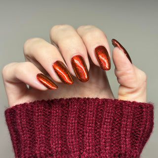 Image provided for Bee's Knees by a paid swatcher featuring the nail polish " The Dark Angel "
