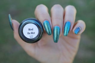 Image provided for Bee's Knees by a paid swatcher featuring the nail polish " Mind the Mist "
