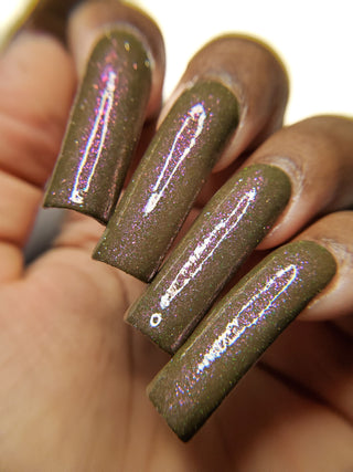 Image provided for Bee's Knees by a paid swatcher featuring the nail polish " Boil Beetle Venom "