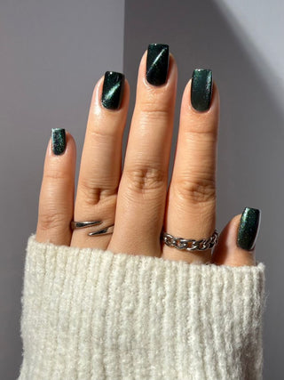 Image provided for Bee's Knees by a paid swatcher featuring the nail polish " Midnight Yoga and Seaweed "