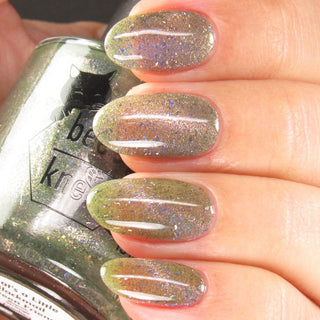 Image provided for Bee's Knees by a paid swatcher featuring the nail polish " What's a Little Blackmail Between Friends "