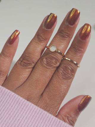 Image provided for Bee's Knees by a paid swatcher featuring the nail polish " The Bar is in Hell "