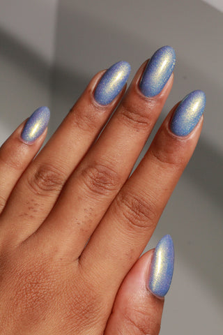 Image provided for Bee's Knees by a paid swatcher featuring the nail polish " Let the Ocean Take Me "