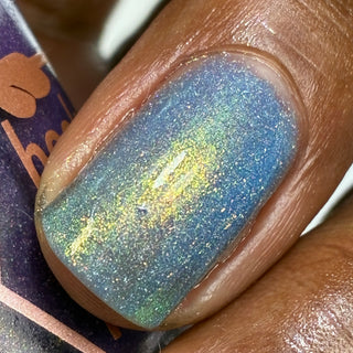 Image provided for Bee's Knees by a paid swatcher featuring the nail polish " Let the Ocean Take Me "