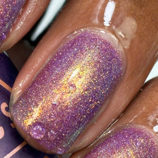 Image provided for Bee's Knees by a paid swatcher featuring the nail polish " Let the Ocean Take Me "