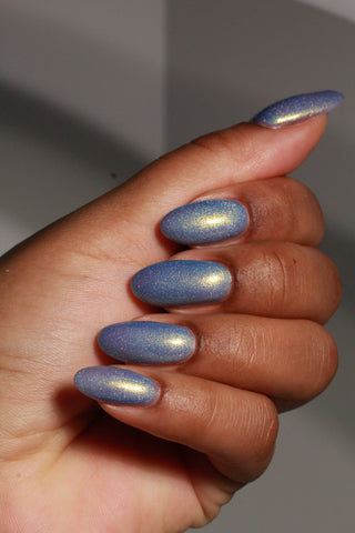 Image provided for Bee's Knees by a paid swatcher featuring the nail polish " Let the Ocean Take Me "