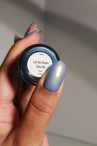 Image provided for Bee's Knees by a paid swatcher featuring the nail polish " Let the Ocean Take Me "