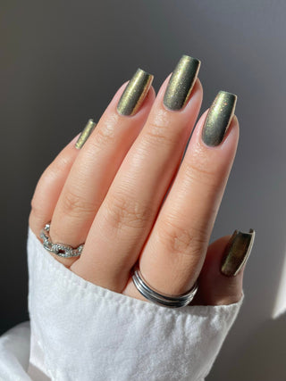 Image provided for Bee's Knees by a paid swatcher featuring the nail polish " Denial "