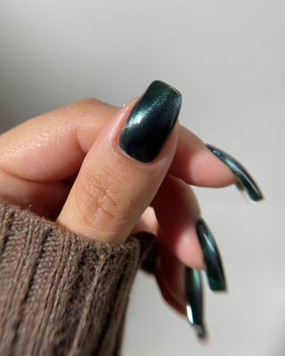 Image provided for Bee's Knees by a paid swatcher featuring the nail polish " Midnight Yoga and Seaweed "