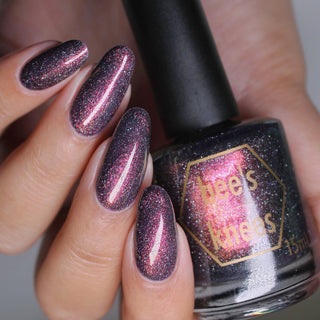 Image provided for Bee's Knees by a paid swatcher featuring the nail polish " The Black Horse "