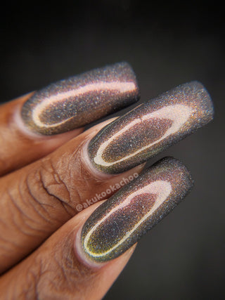 Image provided for Bee's Knees by a paid swatcher featuring the nail polish " Let Me Out "
