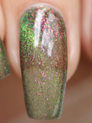 Image provided for Bee's Knees by a paid swatcher featuring the nail polish " Magiphilia "