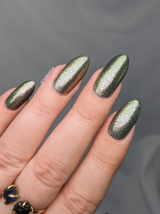 Image provided for Bee's Knees by a paid swatcher featuring the nail polish " Denial "